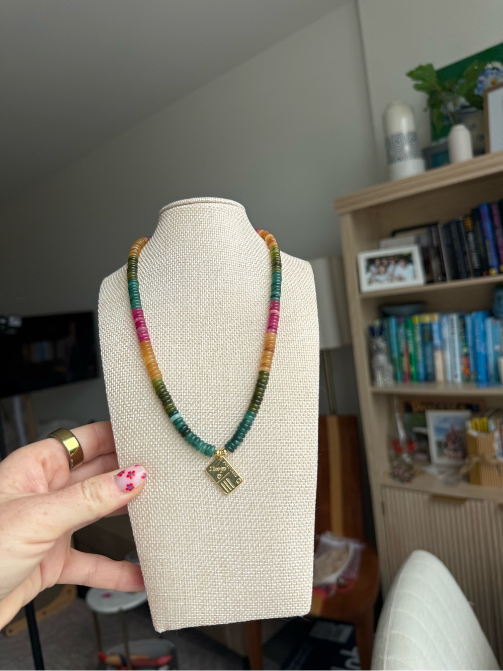 Gemstone necklace with gold plated postcard